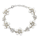 Crystal and pearl daisy bracelet made with ivory pearls and clear crystals, width 2cm. 