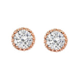 Crystal stud earrings made with clear cubic zirconia crystals and simulated ivory pearls on a rhodium plated rose gold finish, they measure 8mm round
