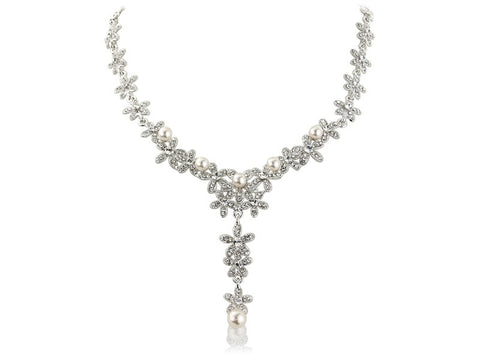 Fully adjustable necklace made from Swarovski crystal elements and high end simulated ivory pearls on a silver tone finish. 