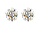 Pearl and crystal clip on earrings made with ivory pearls and high quality cubic zirconia crystals, they measure 2cm by 2cm. 