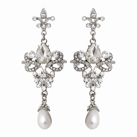 Crystal and pearl earrings made from high quality clear crystals with beautiful simulated ivory pearls on a rhodium plated finish, they have a drop of 7.5cm 