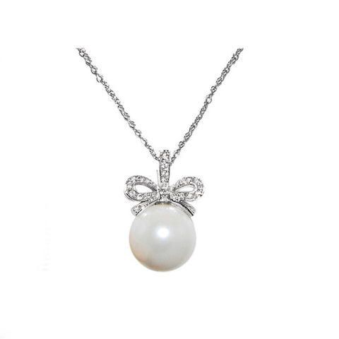 Bow necklace with high quality crystals on a rhodium plated finish, the 2cm bow pendant is finished with a ivory pearl. 
