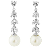 Crystal and pearl earrings made from high quality cubic zirconia clear crystals on a rhodium plated finish with an ivory pearl centre, they have a drop of 3cm. 