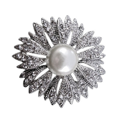 Crystal and pearl brooch made with clear crystals on a silver tone finish and a ivory pearl centre, the brooch measures 4cm by 4cm. 