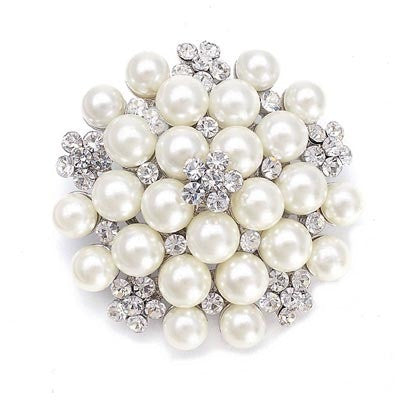 Crystal and pearl brooch made with clusters of pearls inlaid with clear crystals on a rhodium plated finish, brooch measures 5cm by 6cm