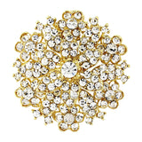 Crystal brooch made with clear crystals on a gold tone finish, brooch measures 8cm wide. 