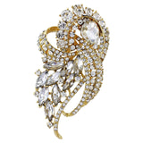 Crystal brooch on a gold tone finish with clear crystals, it measures 9.5cm by 5cm
