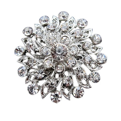 Crystal brooch made with clear crystals on a silver tone finish, brooch measures 3.2cm by 3.2cm