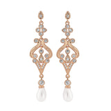 Crystal and pearl chandelier earrings made from high quality clear cubic zirconia crystals on a rhodium plated rose gold finish with freshwater pearls, they have a drop of 2.5cm