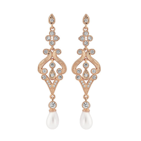 Crystal and pearl chandelier earrings made from high quality clear cubic zirconia crystals on a rhodium plated rose gold finish with freshwater pearls, they have a drop of 2.5cm